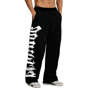 Pantalon de survêtement baggy noir pour homme avec logo imprimé lettres craquelées blanches, taille élastique et cordon de serrage, style décontracté - Product Image 1