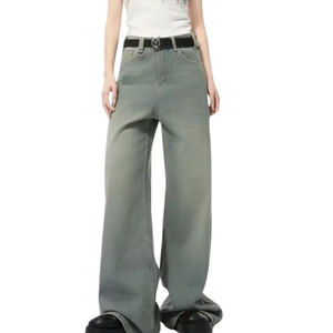 Jean évasé bleu délavé coupe ample et déchiré pour femme, modèle best-seller de la collection mode féminine - Product Image 1