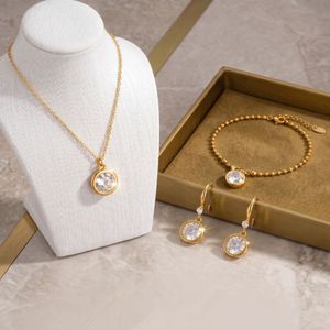 Wholesale Gold Plated Stainless Steel Trendy Zircon Necklace Earrings and <b>Bracelet</b> <b>Set</b> for Niche Fashion Boutique Gift - Product Image 1