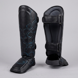 Nouvelles protège-tibias modèle 2026 noir et or avec boucle élastique réglable pour la boxe – Équipement de protection pour adultes avec protège-tibias - Product Image 1