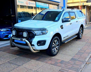 รถกระบะมือสองปี 2022 Ranger Wildtrak 2.0 Bi-Turbo 4x4 เกียร์ออโต้ แบบดับเบิ้ลแค็บ พวงมาลัยซ้าย ภายในสีเข้ม สภาพดี - Product Image 3