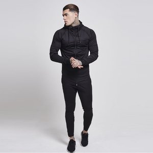 Jogging décontracté noir uni pour homme avec logo, taille élastique, en maille respirante, polyester et coton, poches latérales, idéal pour l'automne - Product Image 3