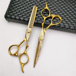 กรรไกรตัดผมมืออาชีพสแตนเลสญี่ปุ่นเคลือบทองคำ รับทำโลโก้ขายส่ง - Product Image 1