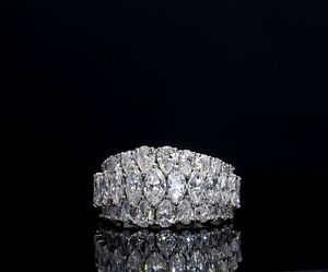 แหวนทองคำแท้ 18K ชุบโรเดียม รุ่นคลาสสิค AMBER JEWELS T-1236 สำหรับทั้งชายและหญิง ประดับด้วยหินธรรมชาติสามเม็ด รับรองโดย IGI ทรงบริลเลียนต์คัท - Product Image 1