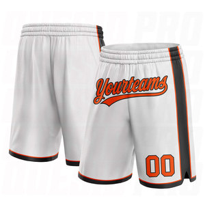 Shorts de basketball personnalisés blancs, oranges et noirs, authentiques, sublimés, respirants et anti-humidité, pour équipes. - Product Image 1