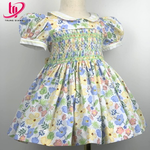 ชุดเดรสเด็กผู้หญิงแบบสม็อคขายส่ง ผ้าฝ้ายเนื้อนุ่มลายดอกไม้ เสื้อผ้าเด็กสั่งทำพิเศษจากโรงงานผลิตเสื้อผ้าเด็กในเวียดนาม - Product Image 1
