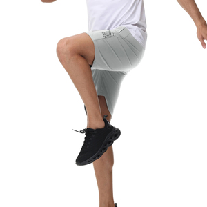 กางเกงขาสั้นผู้ชายคุณภาพสูง ผลิตจากโพลีเอสเตอร์ 95% และสแปนเด็กซ์ 5% เหมาะสำหรับใส่ลำลองช่วงฤดูร้อน ทรงหลวม แห้งเร็ว เหมาะสำหรับออกกำลังกายและฟิตเนส - Product Image 5