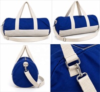 Sac de sport cylindrique en toile avec fermeture éclair et bandoulière réglable