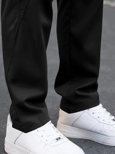 Pantalon cargo classique avec taille réglable par cordon de serrage, tissu en coton doux, grandes poches utilitaires et coupe droite décontractée. - Product Image 2