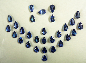 Fábrica de Gemas PDM Vende Tanzanita de Nueva Llegada, Calidad 3A, 7x10mm, Facetada en Forma de Pera, Juego de 29 Piezas, Aproximadamente 58 Quilates - Product Image 1