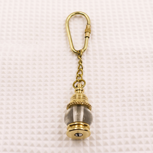 Porte-clés lanterne nautique en laiton antique fait main, logo imprimé en typographie sur métal poli, anneau rond - Product Image 3