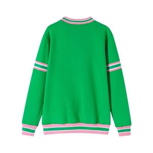 เสื้อสเวตเชิ้ตคอกลมสีเขียวชมพูสำหรับผู้หญิง แขนเสื้อสีดำตัดกัน แต่งแถบปักลายตราสัญลักษณ์ สไตล์ลำลองสำหรับฤดูหนาว เหมาะสำหรับใส่เดินเล่นในเมือง - Product Image 2