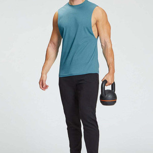 เสื้อกล้ามคอกลมผู้ชาย สีพื้น ผ้าฝ้าย 100% ระบายอากาศได้ดี ผ้าถัก  รับสกรีนโลโก้ สำหรับออกกำลังกายและเพาะกาย - Product Image 1
