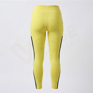 Leggings de yoga taille haute longueur intégrale jaunes avec bande latérale noire en Spandex Nylon extensible dans les quatre sens, conception sans couture - Product Image 2