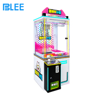 Machine de jeu d'arcade à pousser les objets, distributeur de prix à monnayeur avec joystick et lumières LED pour centres commerciaux et parcs d'attractions