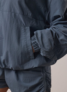 ชุดเซ็ตเสื้อแจ็คเก็ตบอมเบอร์ผ้าทอสีน้ำเงินสไตล์สตรีทแวร์สุดฮิต พร้อมกางเกงขายาวระบายอากาศได้ดี รับสกรีนโลโก้ตามสั่ง - Product Image 6