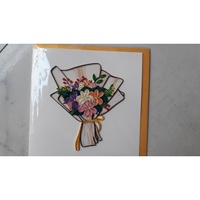 Carte de vœux en papier quilling fait main avec des fleurs colorées et un ruban doré