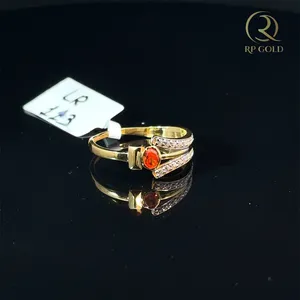 Elegant <b>gold</b> <b>ring</b> with red stone and sparkling accents modern open design stylish jewelry for women perfect for daily wear - Product Image 2