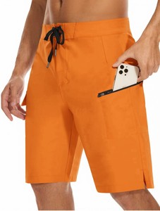 Shorts de plage gris pour homme avec poches zippées, séchage rapide, taille à cordon de serrage, style bermuda décontracté, couleur unie, tissu polyester - Product Image 6