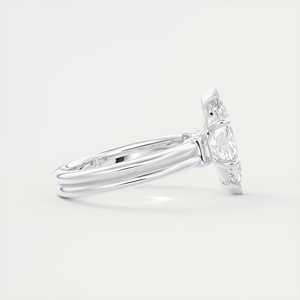 Anillo de compromiso de tres piedras con piedra central marquise de 2.10 quilates y piedras laterales tipo baguette en oro blanco de 14 quilates - Product Image 1