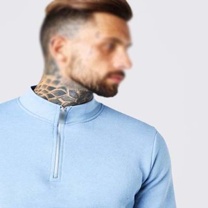 Survêtement pour homme bleu clair à demi-zip, manches longues, coupe classique, couleur unie, vêtement décontracté avec poches latérales. - Product Image 4