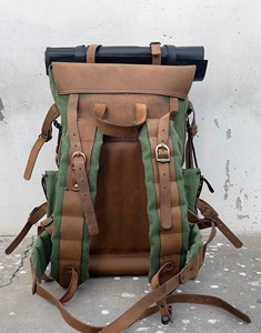 Premium Genuine Leather <b>Water</b> <b>Resistant</b> Canvas <b>Backpack</b> Travel Laptop Bag 36-55L Capacity Customizable Wholesale Private Label - Product Image 4