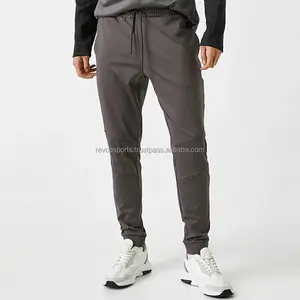 Temel spor sweatpants erkekler hızlı kuru hafif Polyester joggers erkekler için İpli bel yan cepler ter pantolon