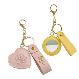Porte-clés en cuir portable en gros avec miroir en forme de cœur et sangle, logo personnalisé pour cadeaux féminins - Product Image 1