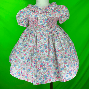 ชุดเดรสสม็อคผ้าฝ้ายนุ่ม พิมพ์ลายดอกไม้ โลโก้สั่งทำได้ ชุดเดรสเด็กผู้หญิงสไตล์เจ้าหญิง ไซส์ตั้งแต่ 3 เดือน ถึง 10 ปี เสื้อผ้าเด็กเวียดนาม - Product Image 1