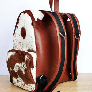 Wholesale cowhide leather hair on <b>backpacks</b> OEM supplier custom logo export quality student bags for sale in wholesale price - Product Image 2