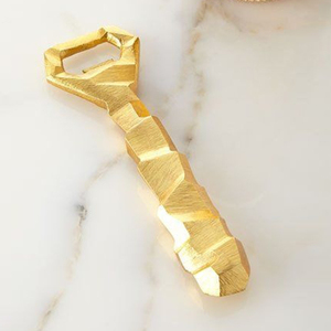 Geometric Rock <b>Bottle</b> Opener Crafted From Premium <b>Brushed</b> Gold Metal Features Chiseled Faceted Handle Perfect For Luxury Bars - Product Image 1
