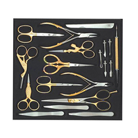 Kit de beauté professionnel en acier inoxydable, couleur semi-or, comprenant coupe-ongles, ciseaux et limes à ongles, avec boîte personnalisable pour logo.
