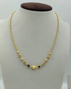 Collar de Oro Amarillo con Cuentas y Ónix Negro, con Estaciones Geométricas y Detalles Texturizados Ornamentados, Joyería Fina Sofisticada para Mujer - Product Image 1