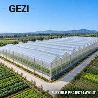 Serre à toit à pannes multiples avec ventilation verticale pour climat chaud et humide, idéale pour la culture commerciale de légumes et les pépinières