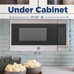 Four à micro-ondes 700 Watts, option de dégivrage automatique ou manuel, essentiels de cuisine pour le comptoir, capacité de 0,7 pied cube - Product Image 3