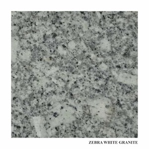 Dalles de granit blanc Zebra emblématiques, surface en pierre naturelle de qualité supérieure pour comptoirs de cuisine et applications architecturales - Product Image 1