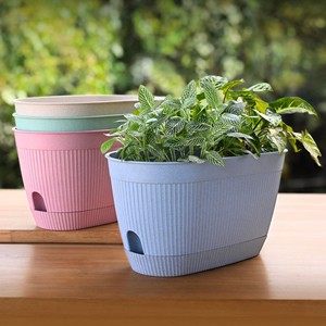Self-Watering <b>Plastic</b> <b>Planters</b> Wholesale | Colorful Garden Pots Bulk - Product Image 1