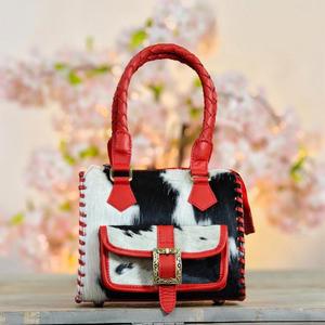 Bolso de mano de cuero vacuno de lujo con asas trenzadas y correa cruzada con cierre de cremallera - Product Image 2