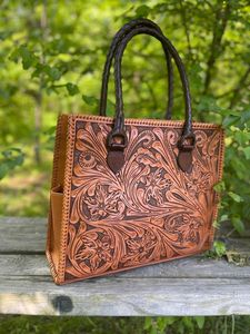 Luxury Handcrafted Floral Tooled Leather Tote Bag with Western Cowhide Accent and Vintage Shoulder Style - Product Image 1