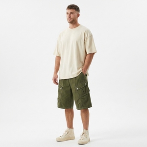 Shorts en jean amples unisexe pour l'été, 100% coton respirant, finition délavée vintage, taille mi-haute, style streetwear décontracté, bords bruts - Product Image 1