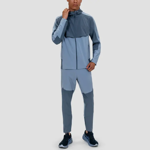 Survêtement bleu pour homme, manches longues, capuche zippée, coupe classique, blocs de couleur, poches latérales, polyester et nylon, pour l'automne, l'hiver et le printemps - Product Image 1