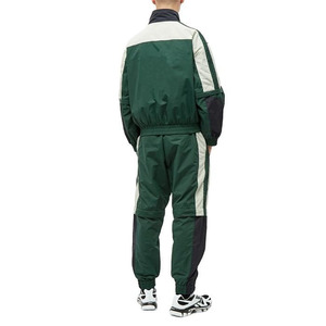 Elite men's dual-tone tracksuits. Engineered with sleek <b>zip</b>-<b>up</b> <b>jackets</b> and matching joggers for ultimate gym style. - Product Image 4