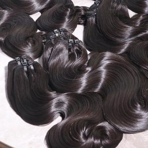 Paquete de Cabello Remy Natural Ondulado Color Natural (1B) Calidad Premium Fábrica Vietnamita Doble Trama a Máquina - Product Image 1