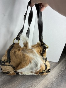 Faux <b>Fur</b> Animal Skin Handbag <b>With</b> Leather Straps And Metal Rings Brown White Color - Product Image 1