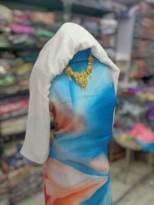 Tela azul tejida con textura irregular para Dirac alemán con estampado abstracto de ondas color melocotón |   Vestido de Novia de Lujo para Niñas con Bordado a Juego - Product Image 2