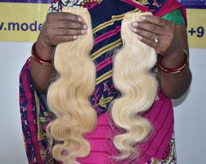 Extensiones de Cabello Humano Natural Sin Procesar 100% Virgen de Templo Indio al por Mayor, de 10 a 32 Pulgadas, Color Sedoso Ondulado - Product Image 1