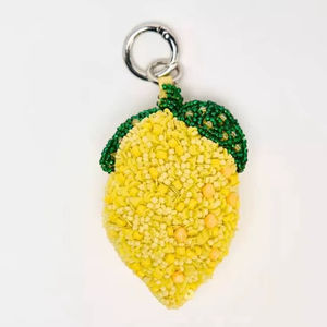 พวงกุญแจดอกลิลลี่ประดับลูกปัด งานปักมือ ของตกแต่งกระเป๋า - Product Image 1