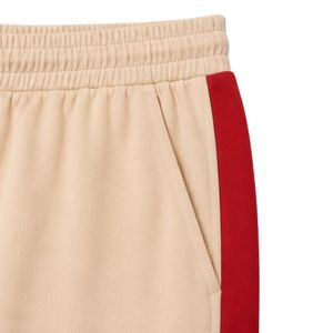 Ensemble décontracté deux pièces beige et rouge pour femme : T-shirt à manches courtes et pantalon large avec rayures contrastées - Product Image 3