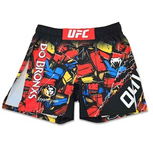 กางเกงชกมวย MMA สำหรับผู้ชาย รุ่นปี 2026 สำหรับฝึกซ้อมและแข่งขัน ระบายอากาศได้ดี มีโลโก้ด้านหน้า ทรงหลวม สวมใส่สบาย ผลิตจากโพลีเอสเตอร์ 100% น้ำหนัก 140 กรัม - Product Image 2