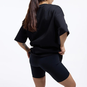 Camiseta de punto transpirable de manga corta con cuello redondo para mujer, corte regular, color liso, estilo casual urbano, hombro caído, venta al por mayor - Product Image 5